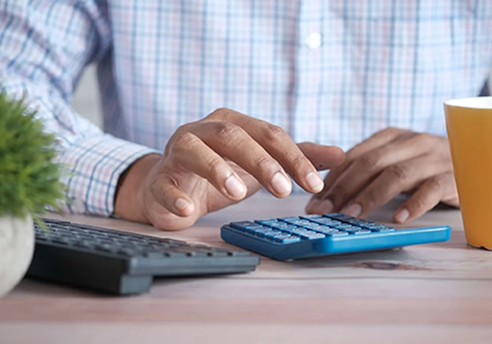 Business owner reviewing SARS tax compliance records and filing obligations